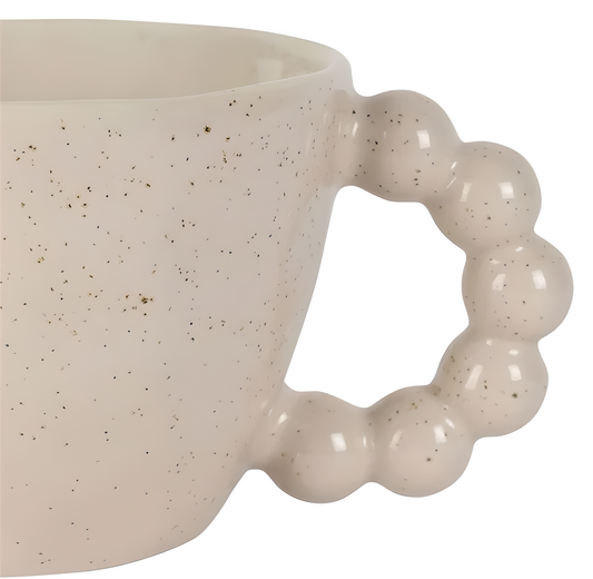 Tasse en grès beige moucheté